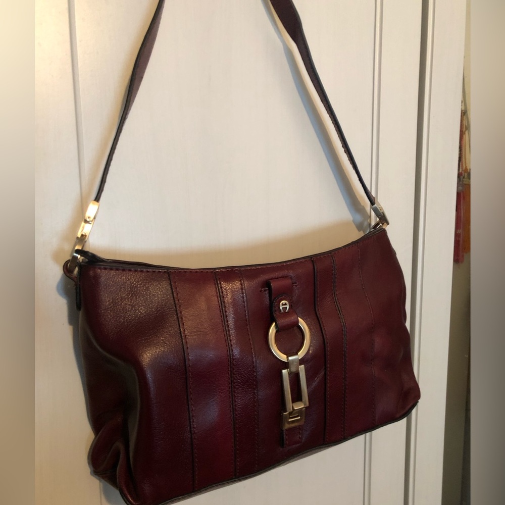 Burgundy purse with 3 large pockets